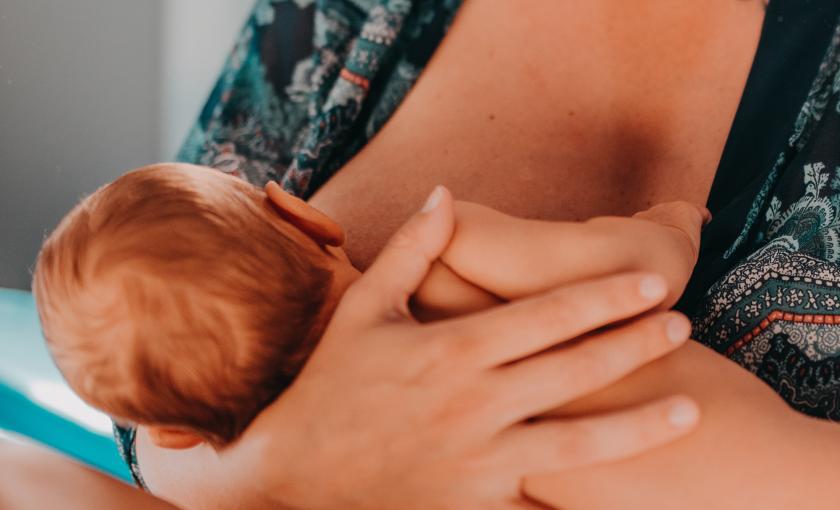 Woman breast feeding her baby