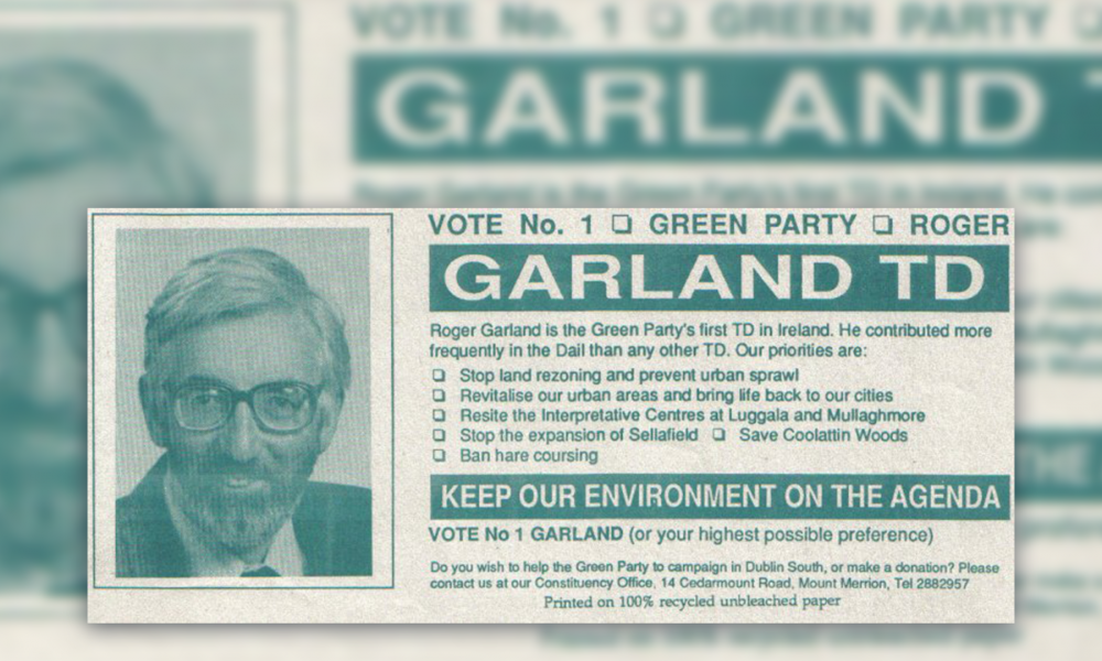 An election leaflet. There is a photo of a man with grey hair and a beard wearing glasses, Roger Garland TD. Text reads, 'Vote No. 1 Green Party'