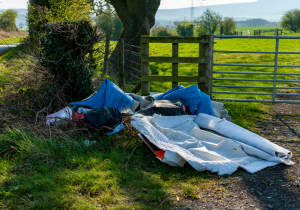 Rubbish dumped on a country lane.
