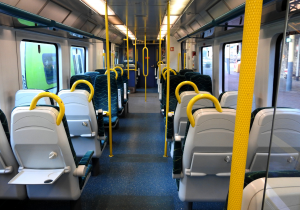 Inside of an empty Irish Rail train carriage.