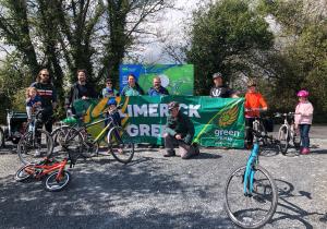 Green Party representatives with a banner at the Limerick Greenway