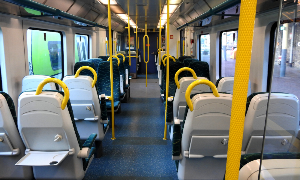 Inside of an empty Irish Rail train carriage.