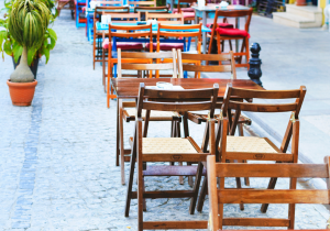 Tables and chairs on the street outside a cafe or restaurant for outdoor dining