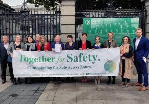 Cross-Party Senators support the Seanad Safe Access Bill drafted by Together for Yes outside Government Buildings
