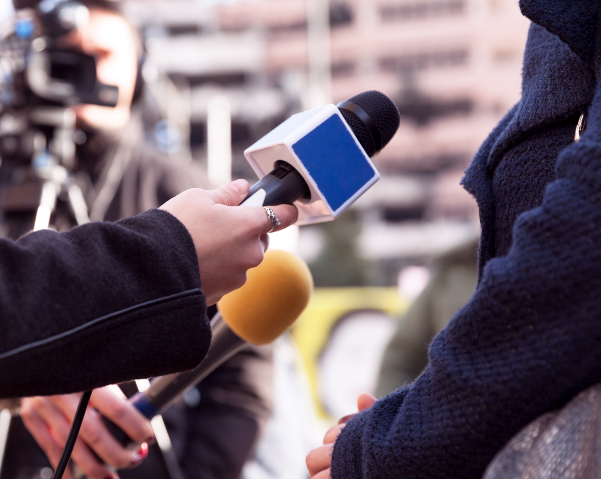 Journalists with microphones